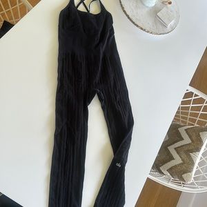 Black Alo catsuit size medium.  Cable knit style. Like new.